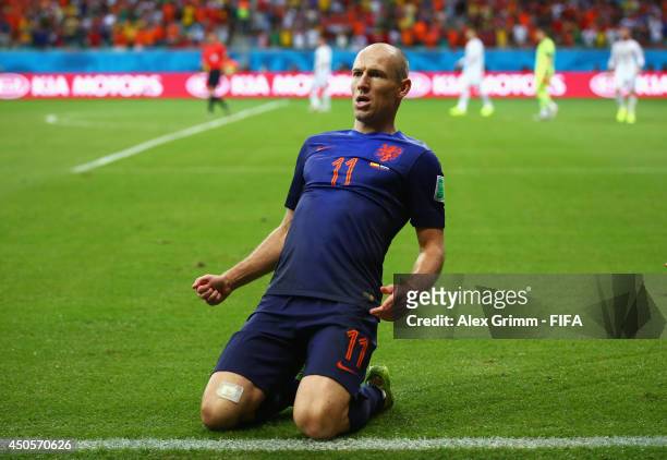 Arjen Robben of the Netherlands celebrates after scoring a goal during the 2014 FIFA World Cup Brazil Group B match between Spain and Netherlands at...