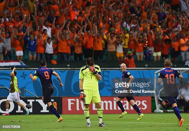 Iker Casillas of Spain reacts after allowing the Netherlands fourth goal to Robin van Persie during the 2014 FIFA World Cup Brazil Group B match...