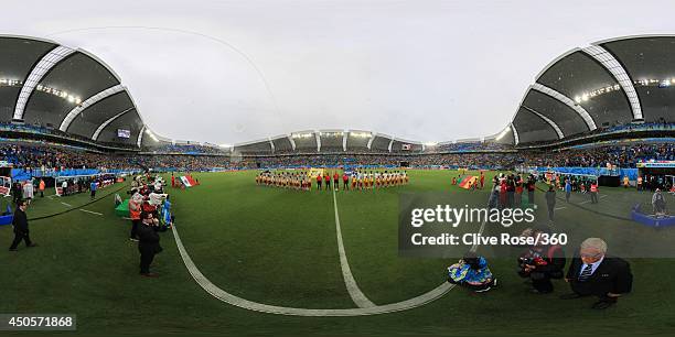 The teams line up before the 2014 FIFA World Cup Brazil Group A match between Mexico and Cameroon at Estadio das Dunas on June 13, 2014 in Natal,...