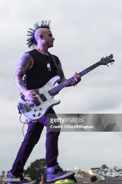 Johnny Christ of Avenged Sevenfold performs on stage headlining on day 1 at Download Festival at Donnington Park on June 13, 2014 in Donnington,...
