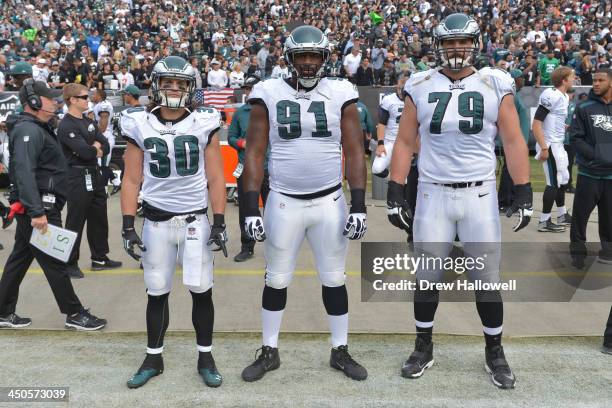 Captians Colt Anderson, Fletcher Cox and Todd Herremans of the Philadelphia Eagles pose for a photograph before the game against the Oakland Raiders...