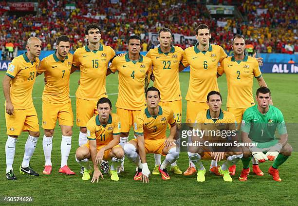 Australia line up for a team photo before the 2014 FIFA World Cup Brazil Group B match between Chile and Australia at Arena Pantanal on June 13, 2014...
