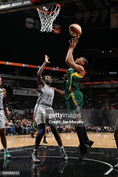 Tanisha Wright of the Seattle Storm shoots during a game against the San Antonio Stars at AT&T Center on June 13, 2014 in San Antonio, Texas. NOTE TO...