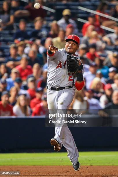 Erick Aybar of the Los Angeles Angels of Anaheim throws to first for an out in the seventh inning against the Atlanta Braves at Turner Field on June...