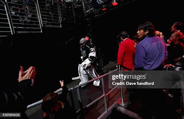 Goaltender Jonathan Quick of the Los Angeles Kings walks to the ice to play in the third period of Game Five of the 2014 Stanley Cup Final against...