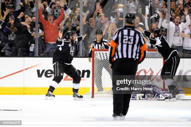 Alec Martinez of the Los Angeles Kings celebrates after scoring the game-winning goal in double overtime against the New York Rangers during Game...