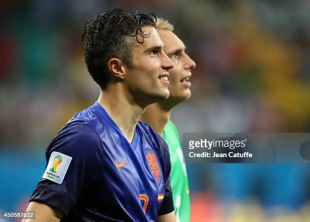 Robin Van Persie and goalkeeper Jasper Cillessen of the Netherlands celebrate the victory after the 2014 FIFA World Cup Brazil Group B match between...