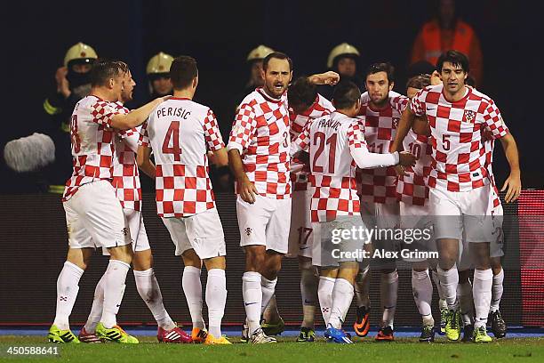 Mario Mandzukic of Croatia celebrates his team's first goal with team mates during the FIFA 2014 World Cup Qualifier play-off second leg match...