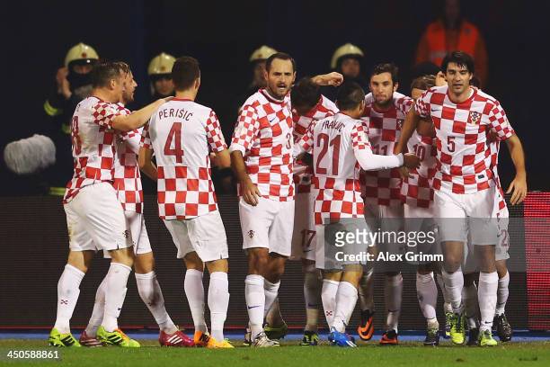 Mario Mandzukic of Croatia celebrates his team's first goal with team mates during the FIFA 2014 World Cup Qualifier play-off second leg match...