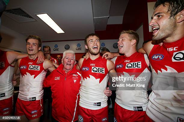 Kieren Jack of the Swans sings the club song with team mates after during the round 13 AFL match between the Sydney Swans and the Port Adelaide Power...