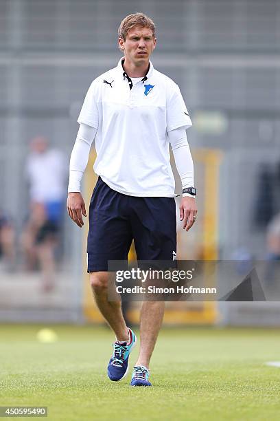 Head coach Julian Nagelsmann of Hoffenheim walks over the pitch prior to the A Juniors Bundesliga Semi Final between 1899 Hoffenheim and FC Schalke...