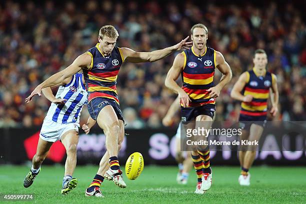 Daniel Talia of the Crows kicks the ball during the round 13 AFL match between the Adelaide Crows and the North Melbourne Kangaroos at Adelaide Oval...
