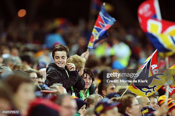 Spectators enjoy the atmosphere during the round 13 AFL match between the Adelaide Crows and the North Melbourne Kangaroos at Adelaide Oval on June...