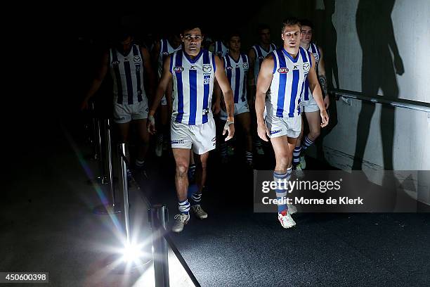 North Melbourne players take to the field after half time during the round 13 AFL match between the Adelaide Crows and the North Melbourne Kangaroos...