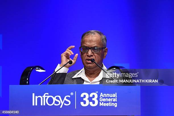 Outgoing chairman of Infosys, N.R. Narayana Murthy addresses share holders during the 33rd Annual General Meeting of the company in Bangalore on June...