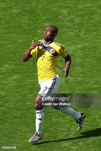Pablo Armero of Colombia celebrates after scoring his team's first goal during the 2014 FIFA World Cup Brazil Group C match between Colombia and...