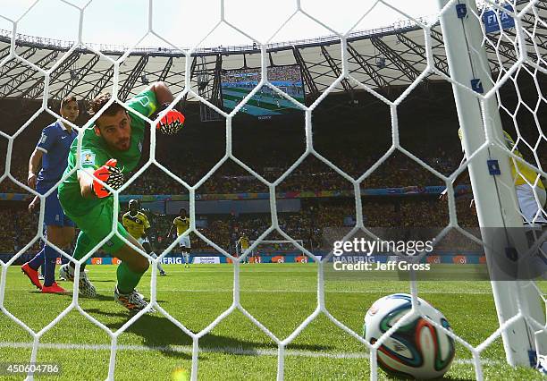 Goalkeeper Orestis Karnezis of Greece fails to save a shot by Pablo Armero of Colombia for his team's first goal during the 2014 FIFA World Cup...