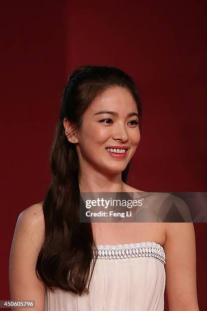 Actress Song Hye Kyo arrives for the red carpet of the 17th Shanghai International Film Festival at Shanghai Grand Theatre on June 14, 2014 in...