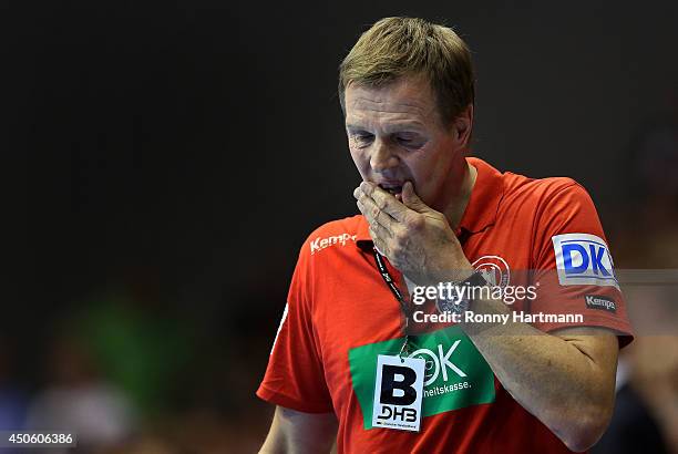 Head coach Martin Heuberger of Germany reacts during the IHF World Championship 2015 Playoff Leg Two between Germany and Poland at Getec-Arena on...