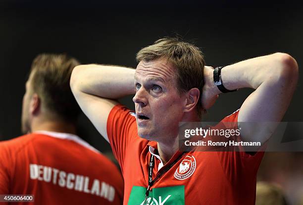 Head coach Martin Heuberger of Germany looks dejected after the IHF World Championship 2015 Playoff Leg Two between Germany and Poland at Getec-Arena...