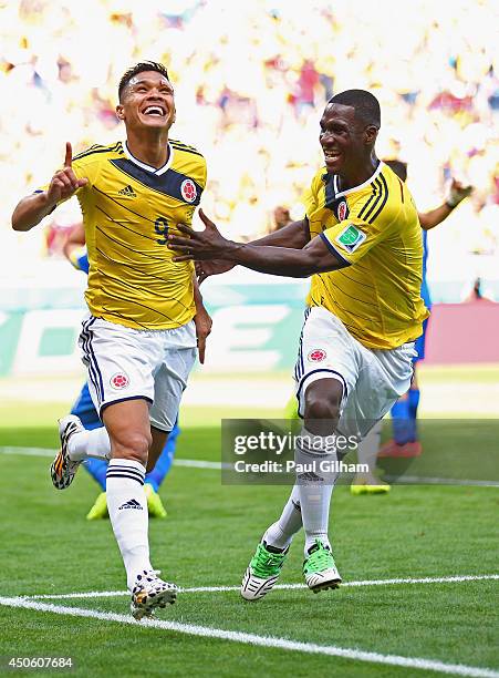 Teofilo Gutierrez of Colombia celebrates scoring his team's second goal with Cristian Zapata during the 2014 FIFA World Cup Brazil Group C match...