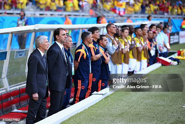 The Colombia coaching staff line up prior to the 2014 FIFA World Cup Brazil Group C match between Colombia and Greece at Estadio Mineirao on June 14,...