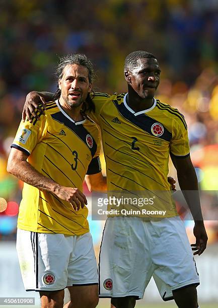 Mario Yepes of Colombia and Cristian Zapata celebrate victory after the 2014 FIFA World Cup Brazil Group C match between Colombia and Greece at...