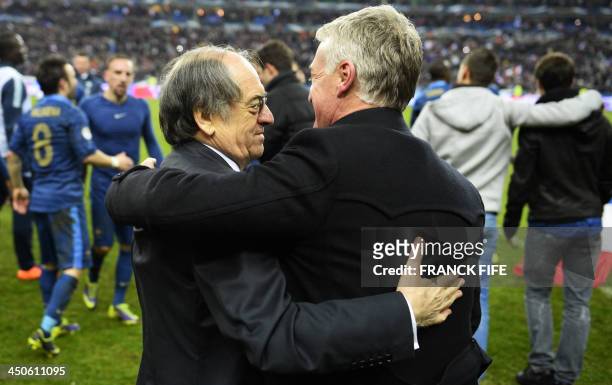 France's head coach Didier Deschamps celebrate with French football Federation president Noel Le Graet at the end of the FIFA World Cup 2014...