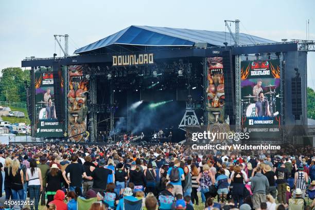 Festival oers enjoy the atmosphere at the main stage during day 2 of Download Festival at Donnington Park on June 14, 2014 in Donnington, United...