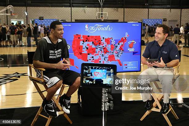 Danny Green of the San Antonio Spurs speaks to Joel Blank for a Facebook chat during practice and media availability as part of the 2014 NBA Finals...