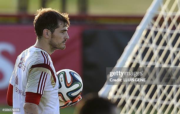 Spain's goalkeeper Iker Casillas takes part in a training session at CT do Caju in Curitiba on June 14 during the 2014 FIFA World Cup. Spain manager...