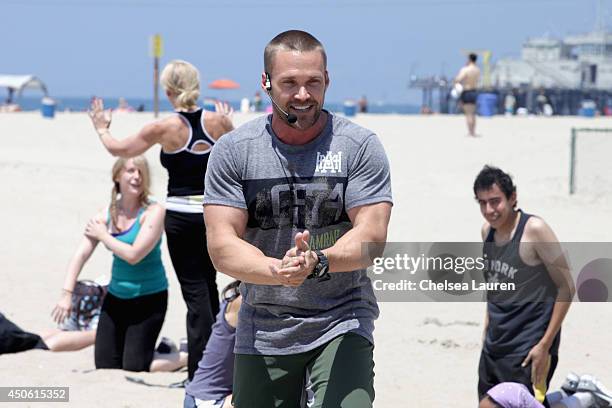 Personal trainer Chris Powell of Team Workout and guests attend OK! Body & Soul 2014 at The Casa Del Mar Hotel on June 14, 2014 in Santa Monica,...