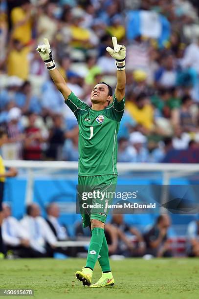 Keylor Navas of Costa Rica celebrates his team's first goal by teammate Joel Campbell during the 2014 FIFA World Cup Brazil Group D match between...