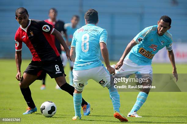 Carlos Lobaton of Sporting Cristal struggles for the ball with Nelinho Quina of FBC Melgar during a match between Sporting Cristal and FBC Melgar as...