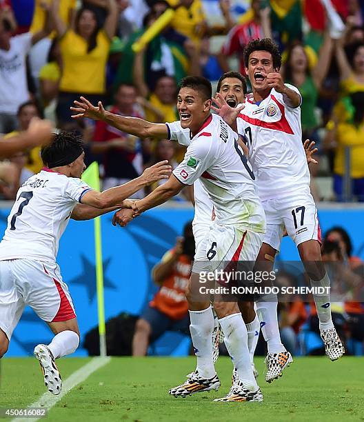 Costa Rica's defender Oscar Duarte celebrates scoring his team's second goal during a Group D football match between Uruguay and Costa Rica at the...