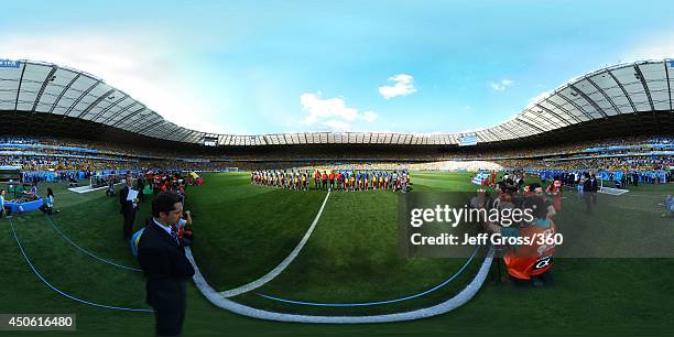 The teams line up before the 2014 FIFA World Cup Brazil Group C match between Columbia v Greece at Estadio Mineirao on June 14, 2014 in Belo...
