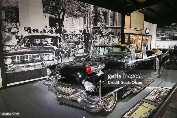 The Secret Service car that followed President John F. Kennedy's limousine when he was shot and killed in Dallas is displayed at the Historic Auto...