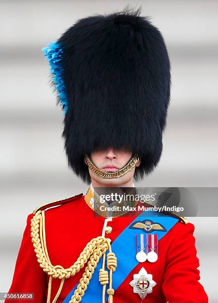 Prince William, Duke of Cambridge rides on horseback down The Mall during Trooping the Colour, Queen Elizabeth II's Birthday Parade on June 14, 2014...