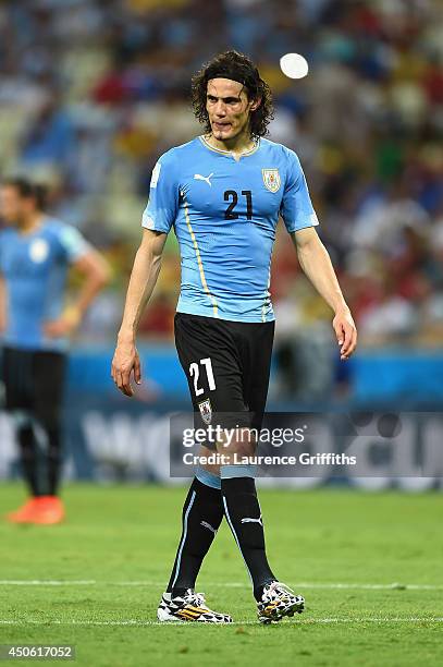 Dejected Edinson Cavani of Uruguay looks down during the 2014 FIFA World Cup Brazil Group D match between Uruguay and Costa Rica at Castelao on June...