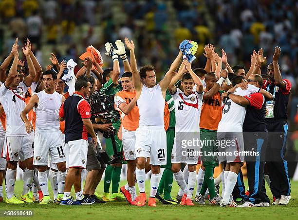 Costa Rica celebrate after defeating Uruguay 3-1 during the 2014 FIFA World Cup Brazil Group D match between Uruguay and Costa Rica at Castelao on...