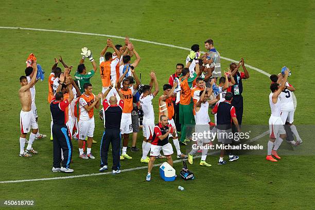 Costa Rica celebrate after defeating Uruguay 3-1 during the 2014 FIFA World Cup Brazil Group D match between Uruguay and Costa Rica at Castelao on...