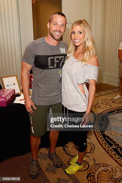 Personal trainers Heidi and Chris Powell attend OK! Body & Soul 2014 at The Casa Del Mar Hotel on June 14, 2014 in Santa Monica, California.