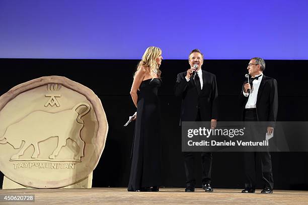 Tiziana Rocca, Mario Sesti and Christian De Sica attend the 60th Taormina Film Fest on June 14, 2014 in Taormina, Italy.