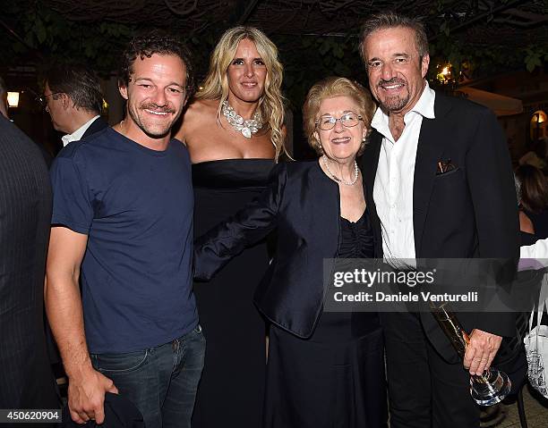 Annamaria Tarantola, Tiziana Rocca, Christian De Sica and Brando De Sica attend the 60th Taormina Film Fest on June 14, 2014 in Taormina, Italy.