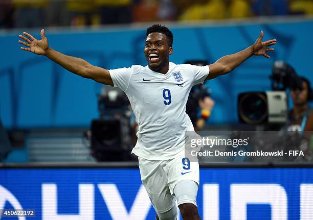 Daniel Sturridge of England celebrates after scoring the team's first goal during the 2014 FIFA World Cup Brazil Group D match between England and...