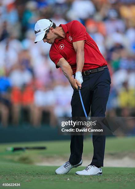 Adam Scott of Australia hits his tee shot on the 13th hole during the third round of the 114th U.S. Open at Pinehurst Resort & Country Club, Course...