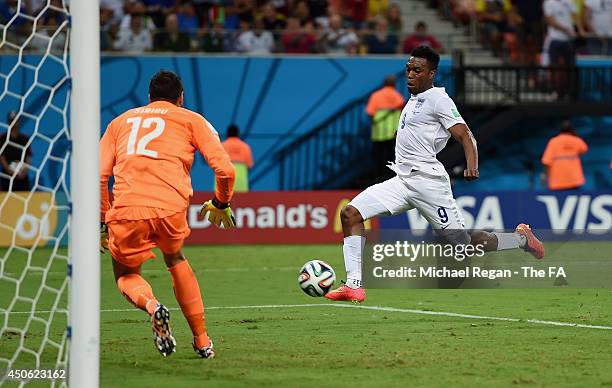 Daniel Sturridge of England shoots and scores his team's first goal past Salvatore Sirigu of Italy during the 2014 FIFA World Cup Brazil Group D...