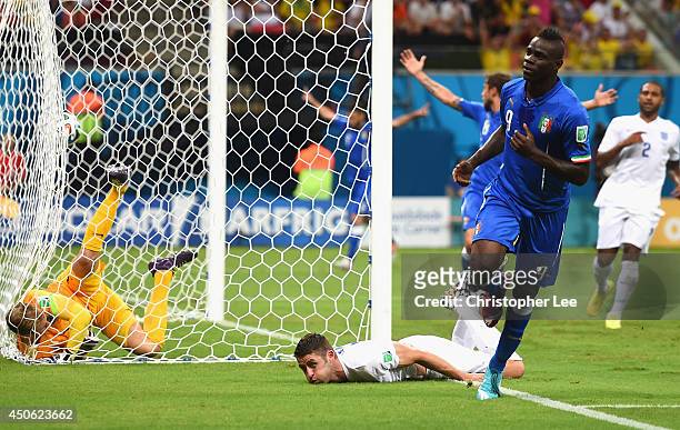 Mario Balotelli of Italy celebrates after scoring the second goal during the 2014 FIFA World Cup Brazil Group D match between England and Italy at...