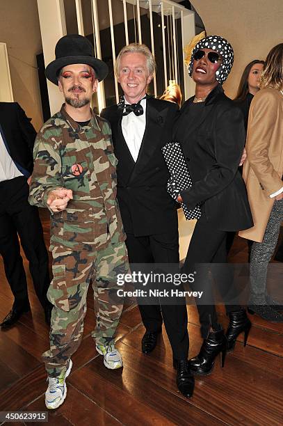Boy George, Philip Treacy and Grace Jones attend the private view of Isabella Blow: Fashion Galore! Party at Somerset House on November 19, 2013 in...