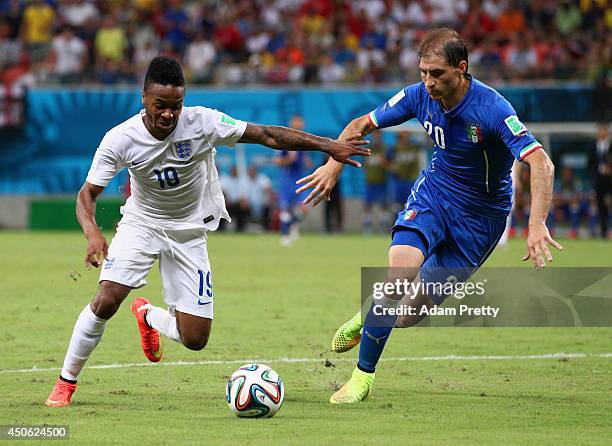 Raheem Sterling of England controls the ball against Gabriel Paletta of Italy during the 2014 FIFA World Cup Brazil Group D match between England and...